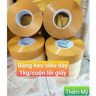 Băng keo dán thùng trong, đục siêu dày 1kg/cuộn.Lõi giấy mỏng.